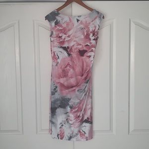 Pink rose dress with gathered left side. size M. Very comfortable. Machine wash